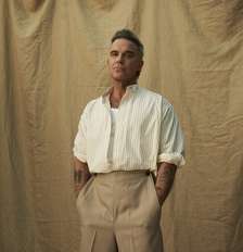 Robbie Williams virá ao Brasil pela primeira vez em 20 anos para show em São Paulo em outubro Foto: Robbie Williams/Bonus Track/Divulgação / Estadão
